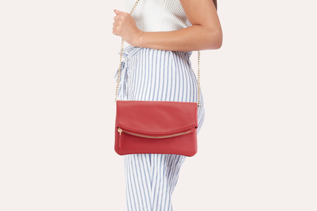 Kiko flap clutch bag in genuine pebble leather with removable chain strap and magnetic closure