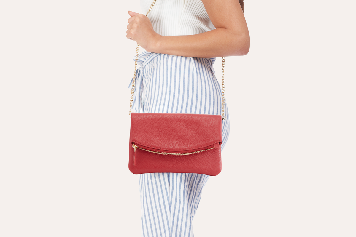 Kiko flap clutch bag in genuine pebble leather with removable chain strap and magnetic closure