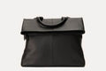 Genuine pebble leather Fold N Go Backpack with adjustable straps and multiple pockets for organized carrying