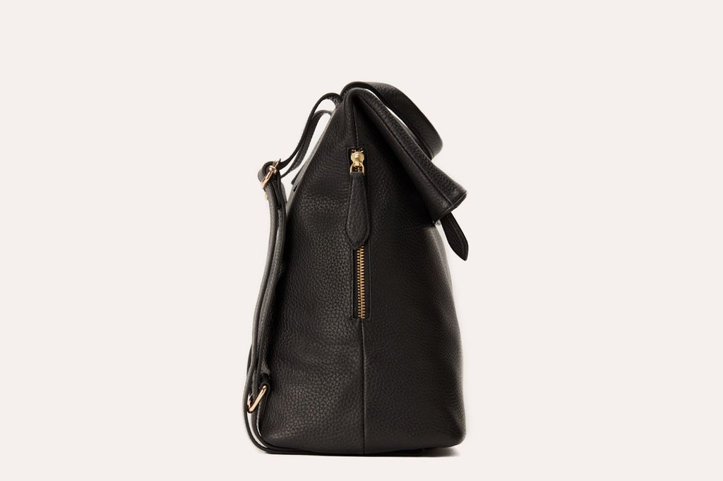Genuine pebble leather Fold N Go Backpack with adjustable straps and multiple pockets for organized daily use