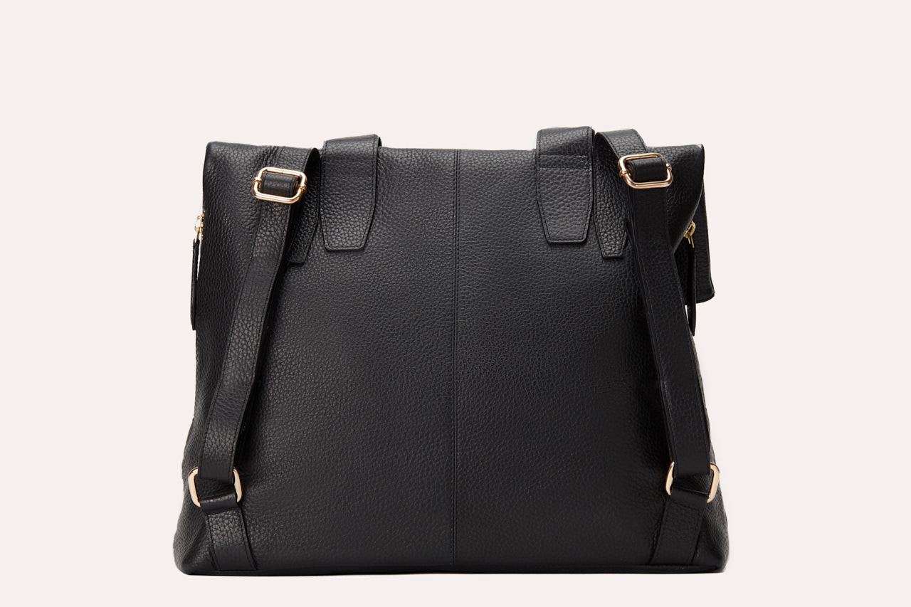 Genuine pebble leather Fold N Go Backpack with adjustable straps and multiple pockets for organized daily use