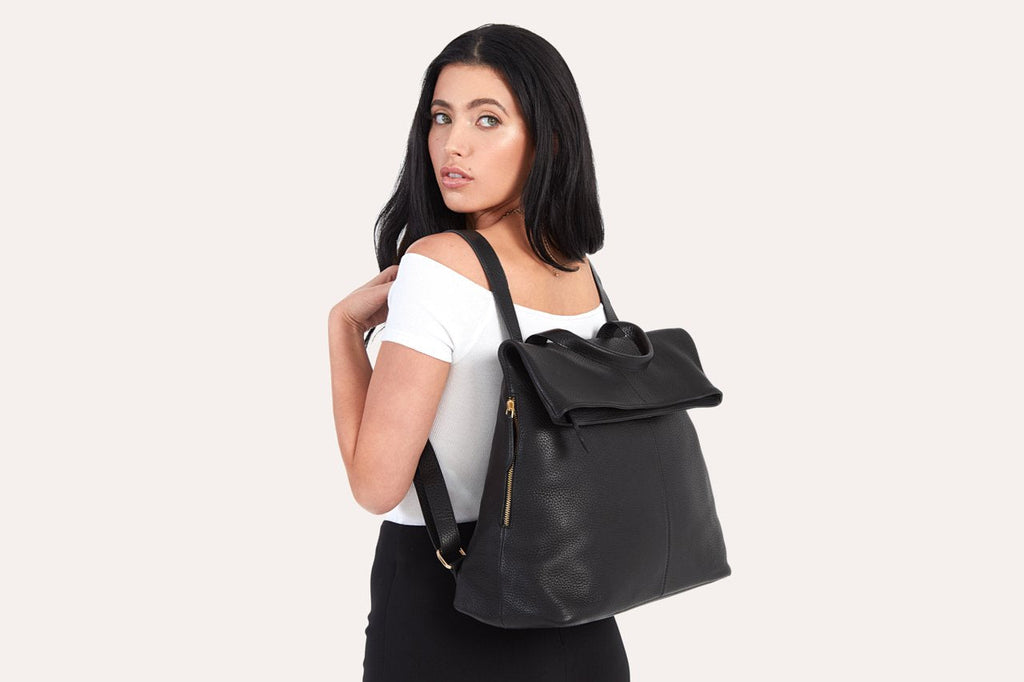 Genuine pebble leather Fold N Go Backpack with adjustable straps and multiple pockets for organization