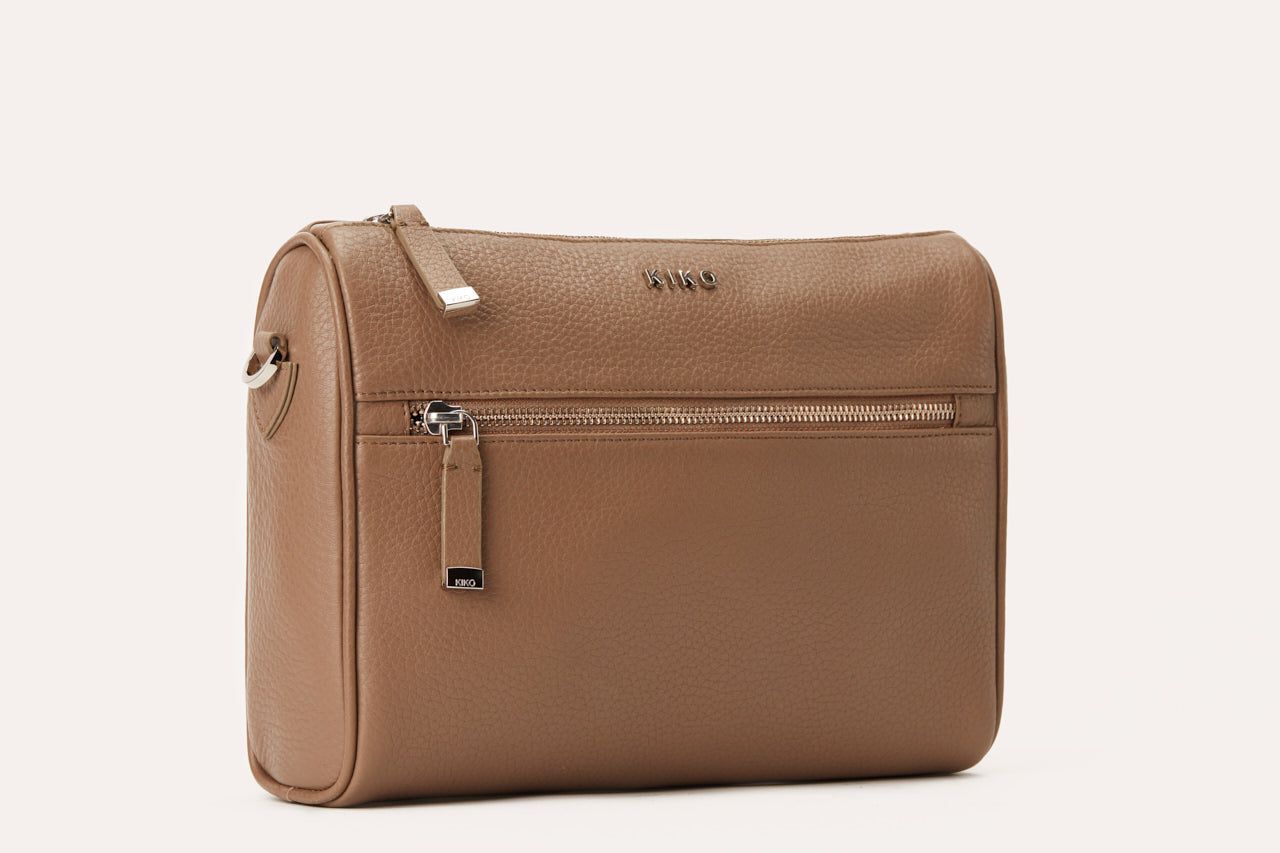 Genuine pebble leather crossbody bag with adjustable strap and multiple pockets for organized daily use