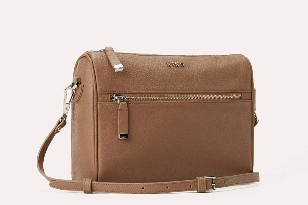 Genuine pebble leather crossbody bag with adjustable strap and multiple pockets for everyday use