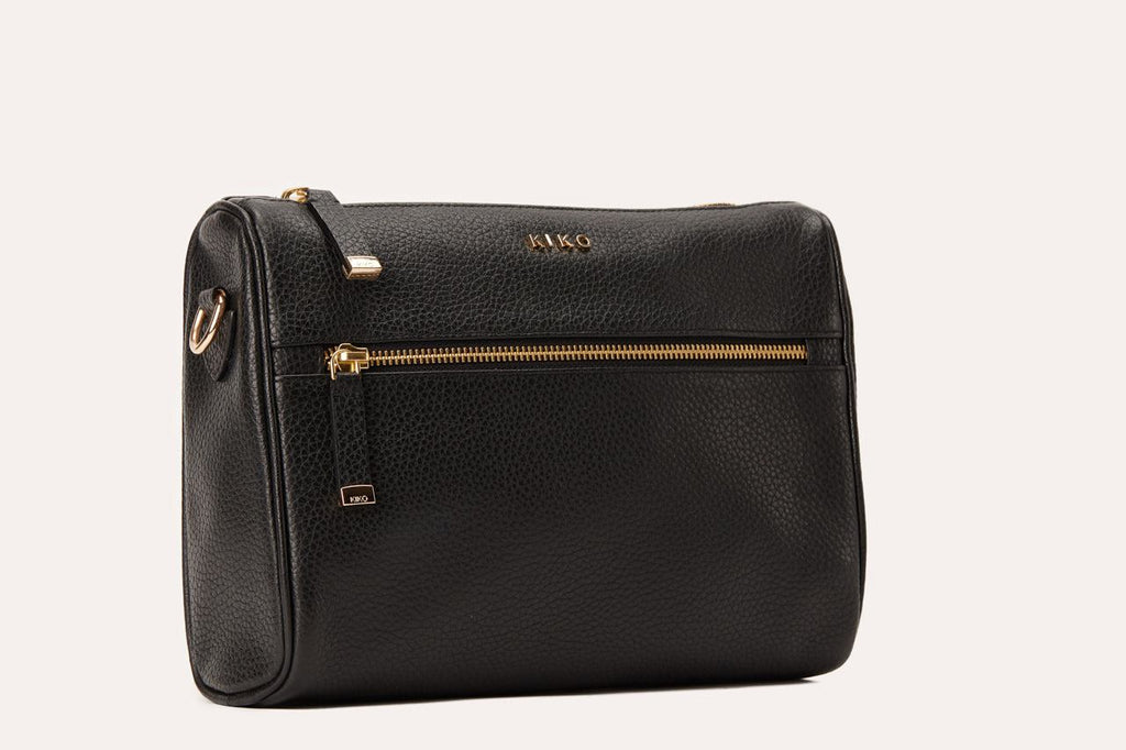 Genuine pebble leather crossbody bag with adjustable strap and multiple pockets for everyday use