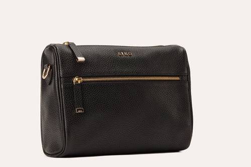 Genuine pebble leather crossbody bag with adjustable strap and zippered pockets for everyday use