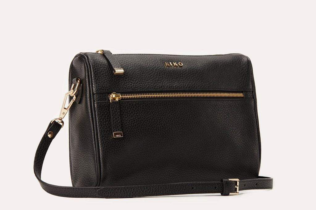 Genuine pebble leather crossbody bag with adjustable strap and multiple pockets for organized daily use