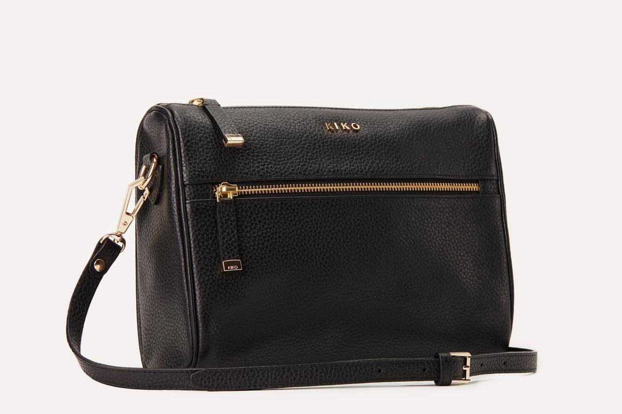 Genuine pebble leather crossbody bag with adjustable strap and multiple pockets for organized daily use