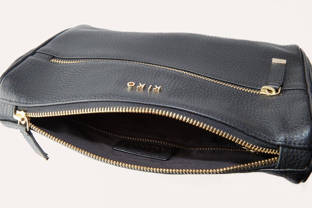 Genuine pebble leather crossbody bag with adjustable strap and multiple pockets for everyday use