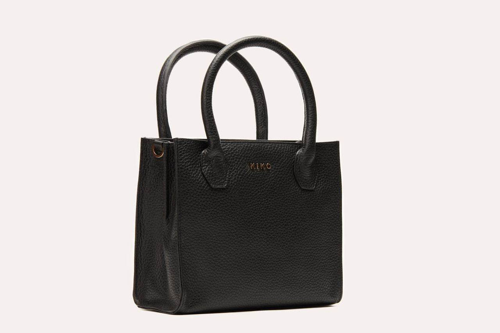 Kiko minimalist crossbody bag in genuine pebble leather with adjustable strap and secure zipper pocket