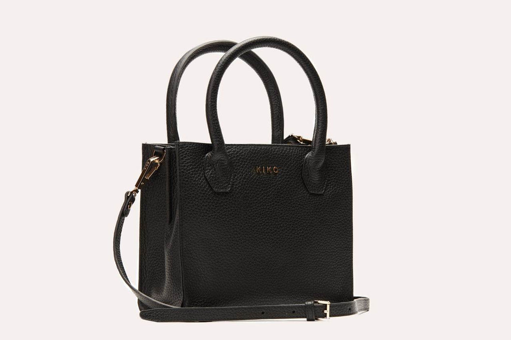 Kiko minimalist crossbody bag in genuine pebble leather with adjustable strap and center zipper pocket