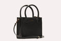 Kiko minimalist crossbody bag in genuine pebble leather with adjustable strap and center zipper pocket