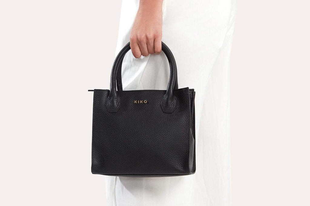 Kiko minimalist crossbody bag in genuine pebble leather with adjustable strap and secure zipper pocket