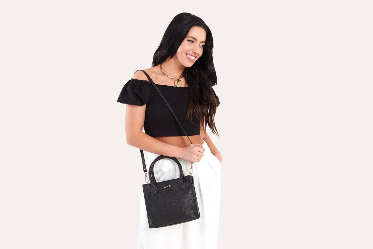 Kiko Minimalist Crossbody Bag in genuine pebble leather with adjustable strap and secure zipper pocket