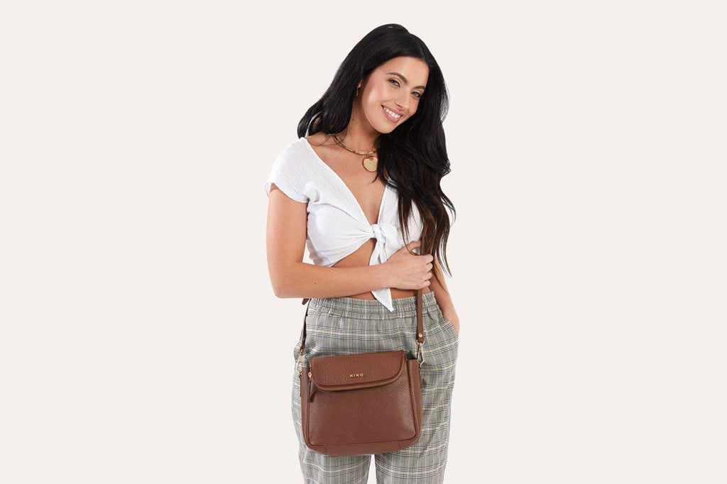 Kiko Fold Over Crossbody bag in genuine pebble leather with magnetic closure and adjustable strap