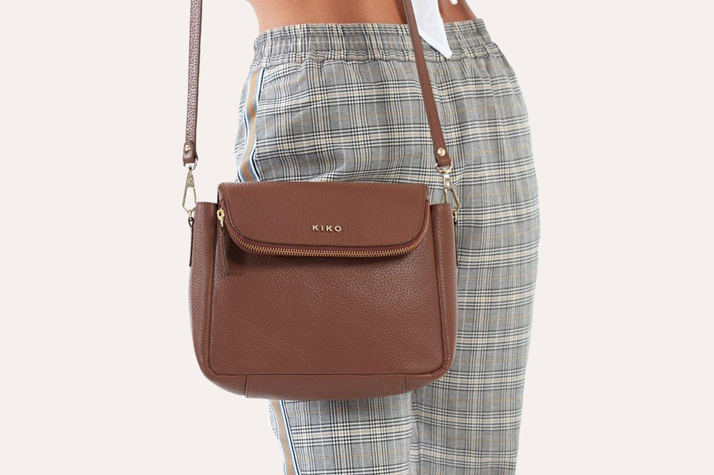 Kiko Fold Over Crossbody bag in genuine pebble leather with magnetic closure and adjustable strap