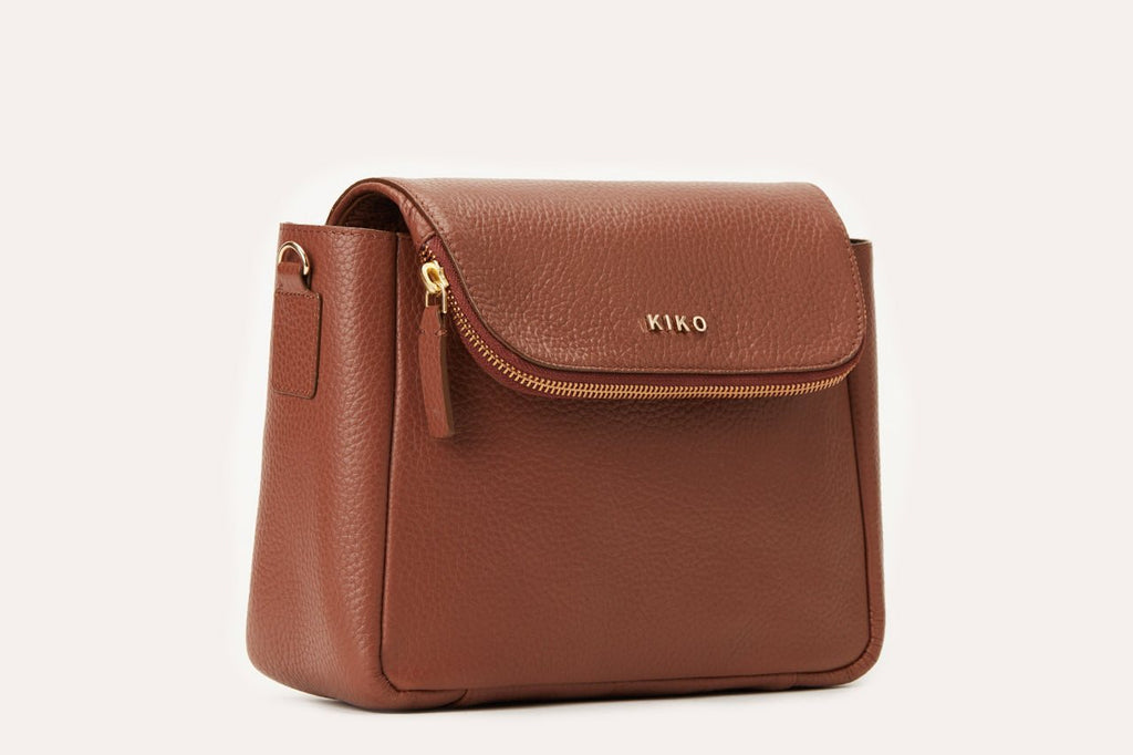 Kiko Fold Over Crossbody bag in genuine pebble leather with magnetic closure and adjustable strap