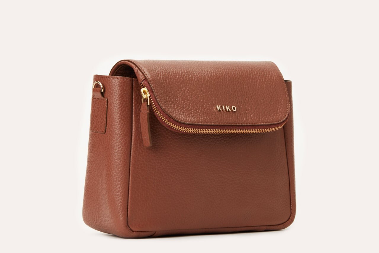 Kiko Fold Over Crossbody bag in genuine pebble leather with magnetic closure and adjustable strap