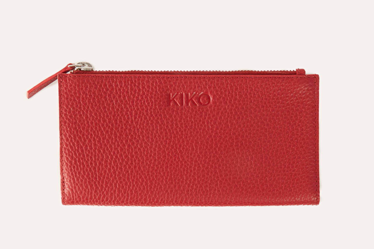 Genuine pebble leather top zip wallet with multiple card slots, bill sleeves, and coin pouch in classic elegant design