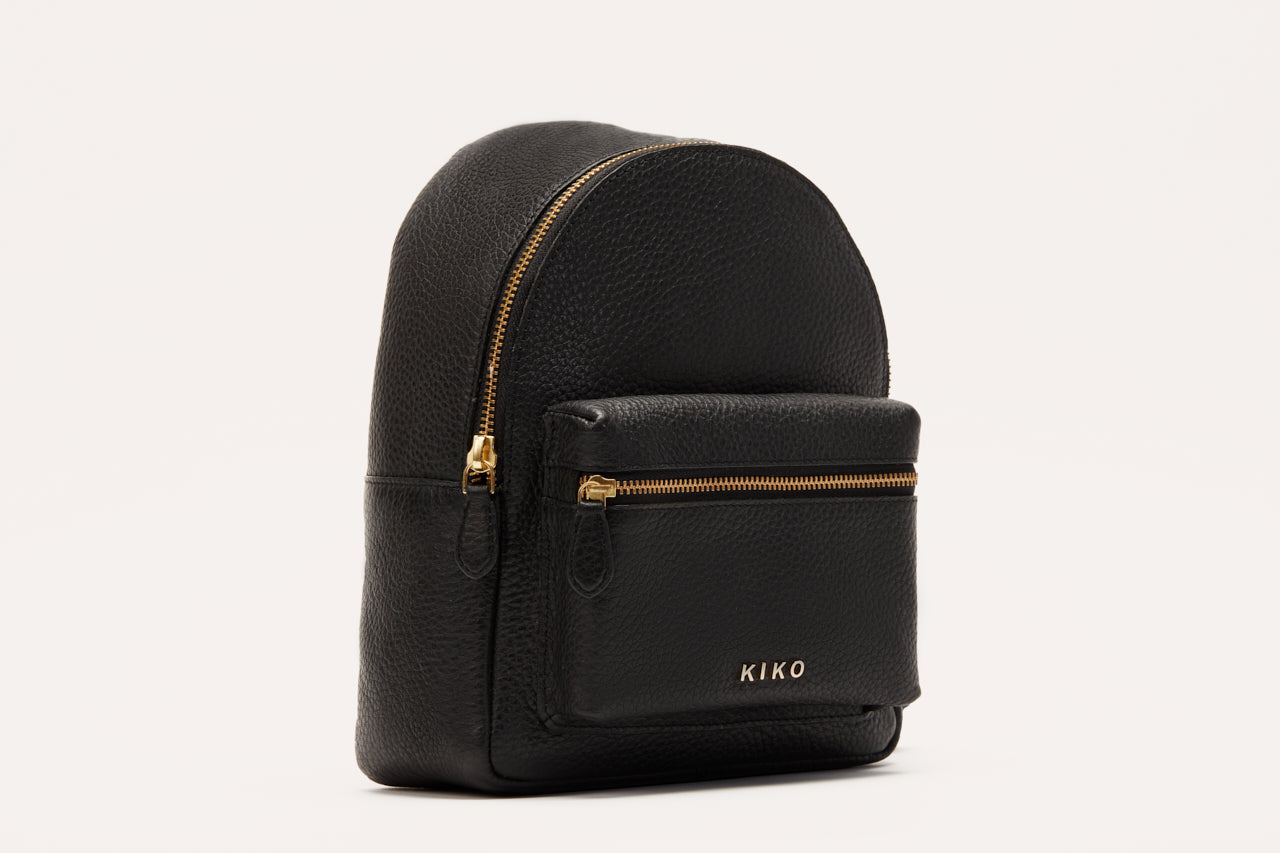 Compact genuine pebble leather backpack with adjustable straps and internal zipper pocket