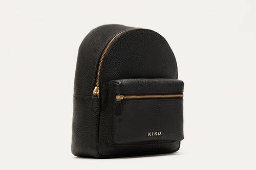 Compact genuine pebble leather backpack with adjustable straps and internal zipper pocket for everyday essentials