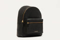 Compact genuine pebble leather backpack with adjustable straps and internal zipper pocket for everyday essentials