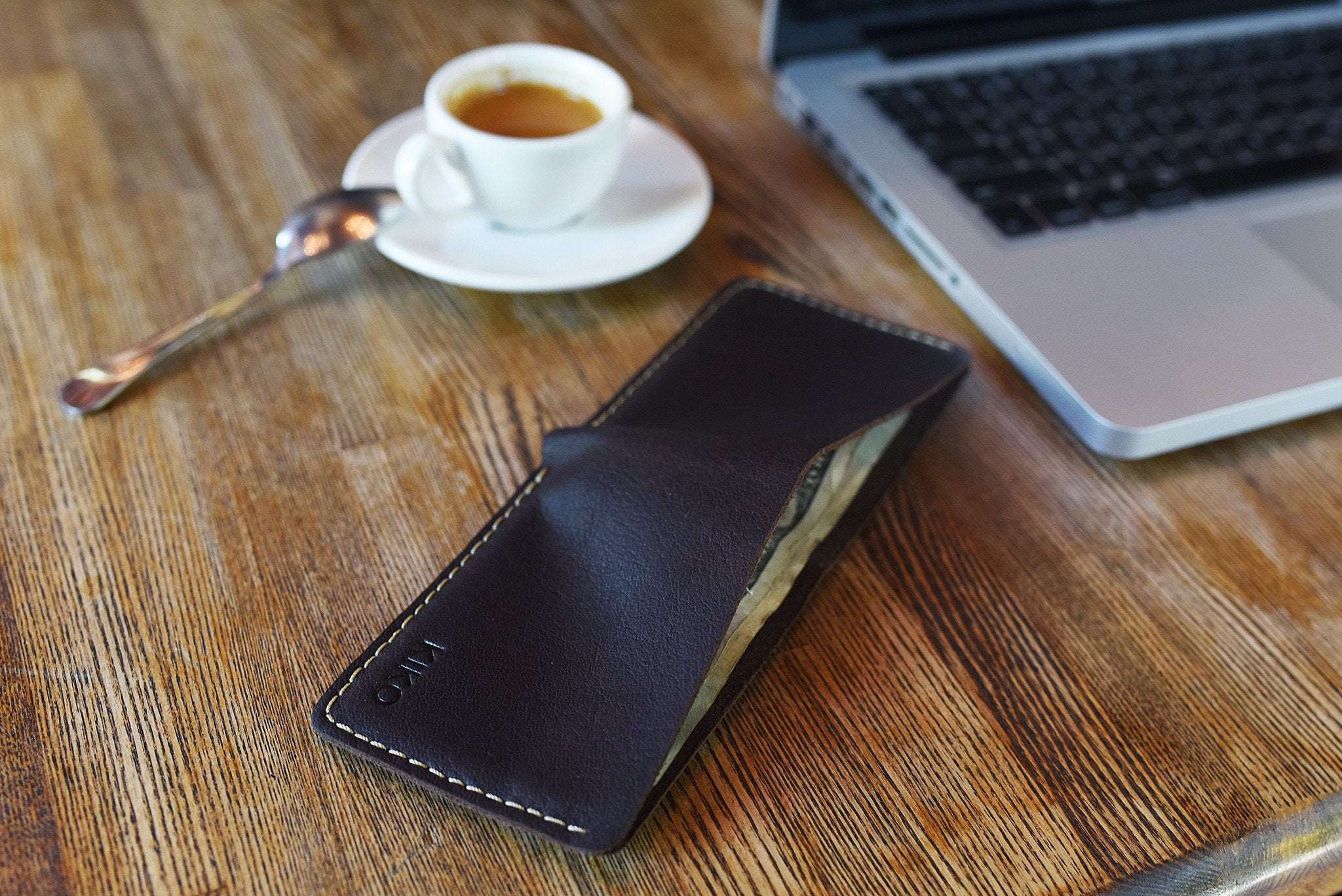 Wave Bifold Leather Wallet with six card slots and full-size bill compartment in slim bifold design