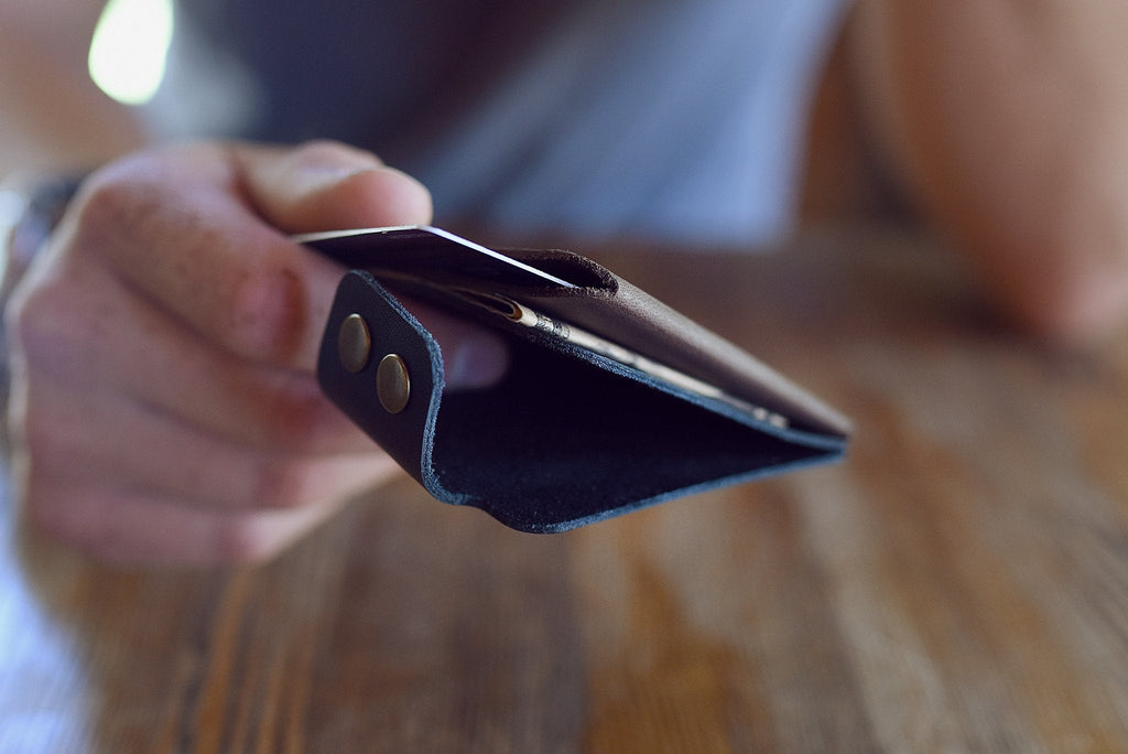 Slim Kiko Card Wallet in leather with brass button flap and artisan stitching for stylish card organization