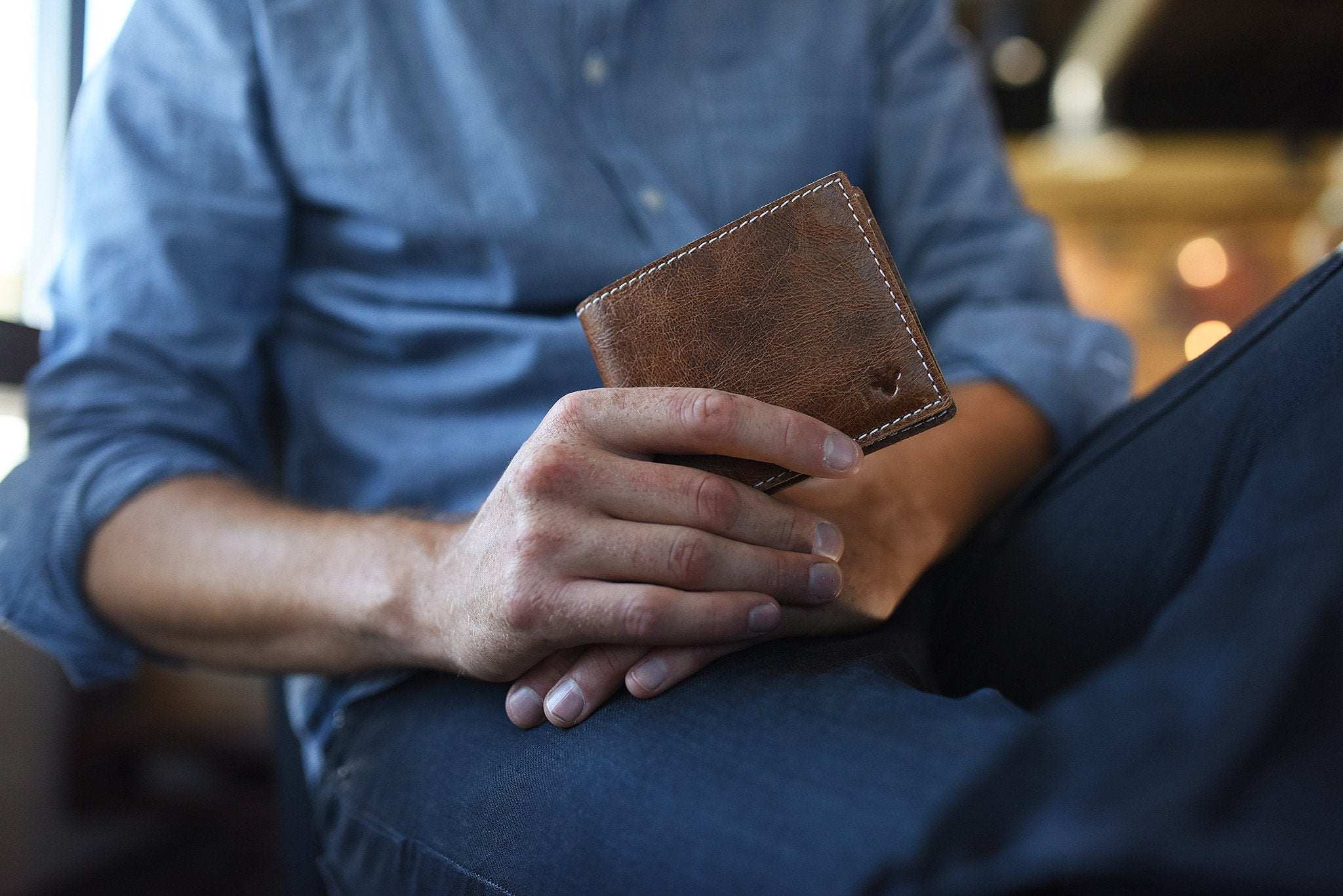 Kiko Leather X Bifold Wallet with white stitching and X detail on natural leather