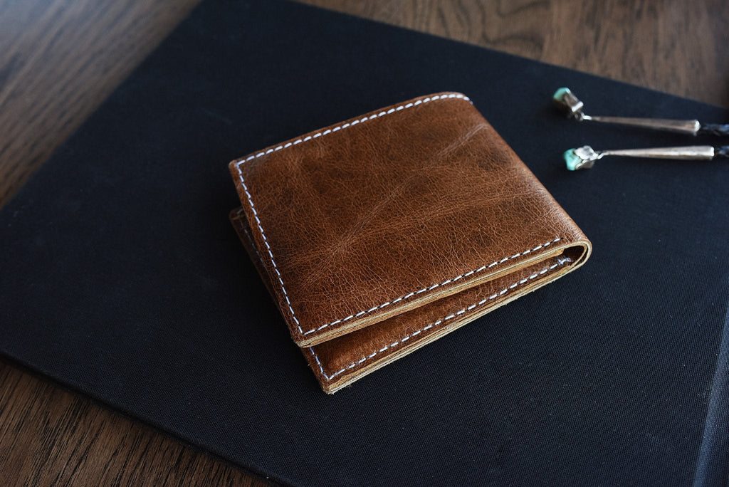 Kiko Leather X Bifold Wallet with white stitching and five card slots in natural leather