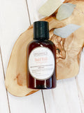 Bottle of Organic Beard Wash by Butter Me Up Organics for soft, shiny, and manageable beard care