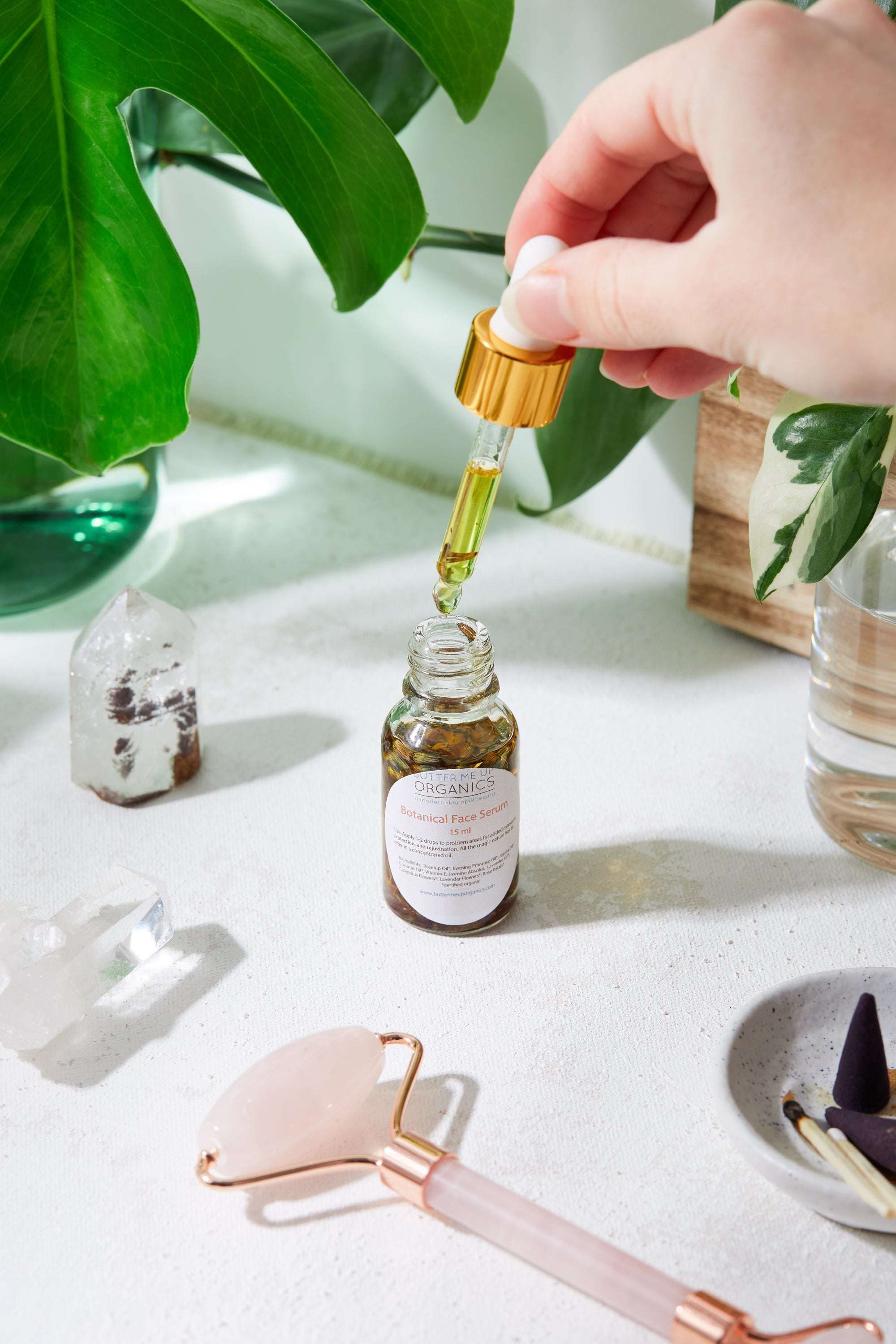 Luxurious Healing Face Serum in elegant Italian glass bottle with organic oils and herbs