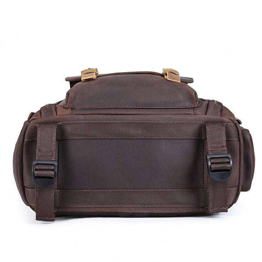 Gaetano large leather camera bag backpack made of full-grain crazy horse leather with padded straps and multiple compartments for camera gear and laptop