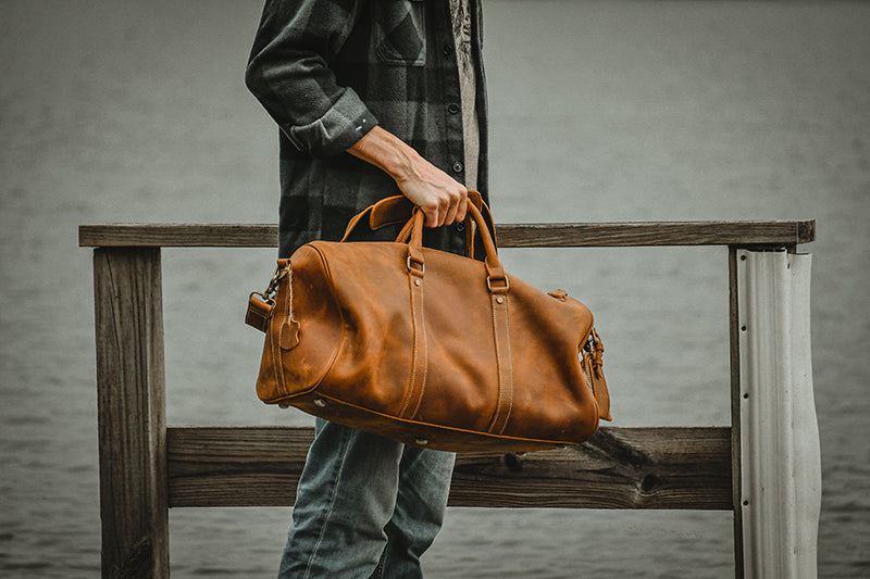 Dagny Leather Weekender Duffle Bag in vintage crazy horse leather with spacious compartments and removable shoulder strap