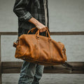 Dagny Leather Weekender Duffle Bag in premium crazy horse leather with spacious compartments and removable shoulder strap