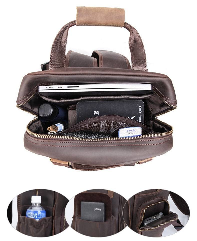 Large leather camera bag backpack in rugged full-grain crazy horse leather with padded straps and multiple compartments for photography gear and laptop.