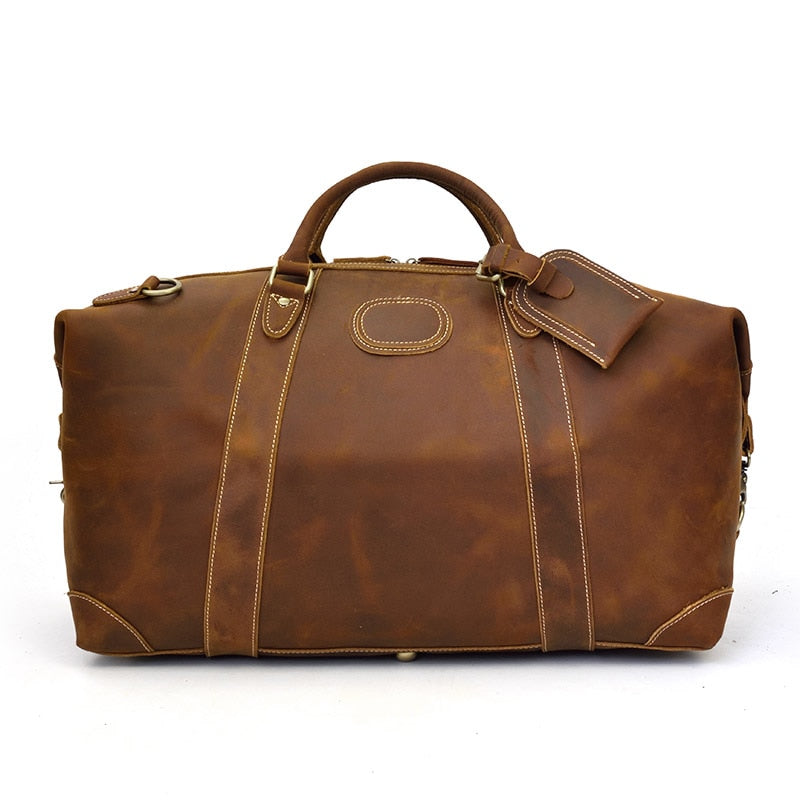 Vintage leather duffle bag crafted from premium crazy horse leather with spacious compartments and adjustable shoulder strap