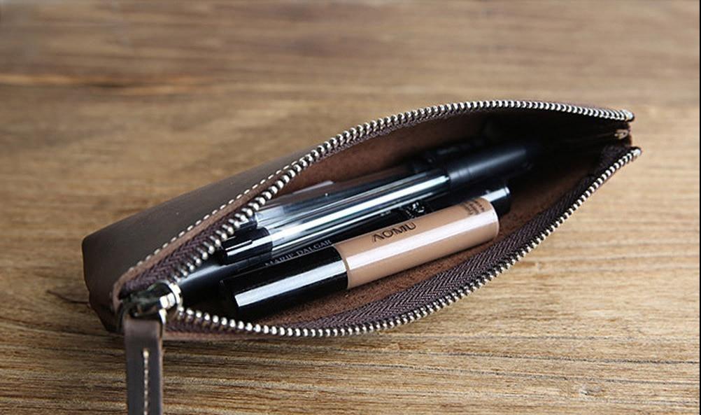 Handmade leather makeup bag in full-grain crazy horse leather with sturdy YKK zipper and sleek design