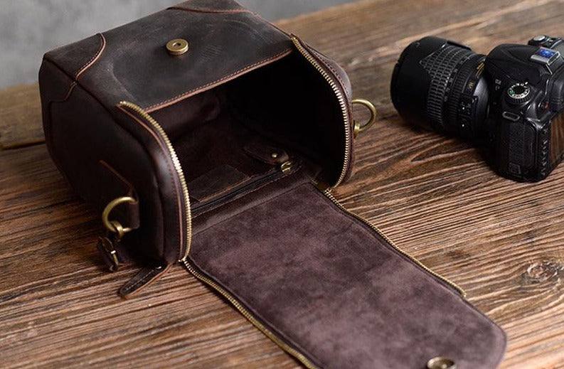Handcrafted small leather camera bag Calista made of full-grain vegetable-tanned crazy horse leather with adjustable shoulder strap and zippered compartments