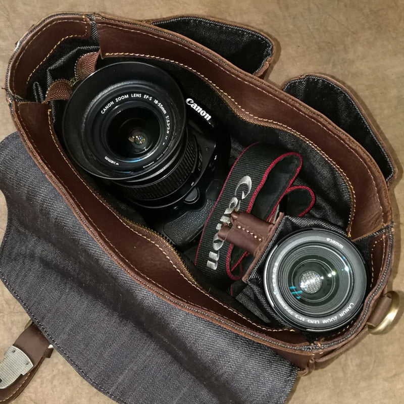The Faust Leather Crossbody Messenger Bag in full-grain crazy horse leather with adjustable strap and camera compartments