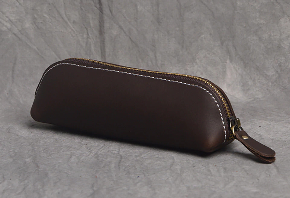 Paavo Leather Pen Case handcrafted from full grain crazy horse leather with brass YKK zipper, compact and durable makeup pouch