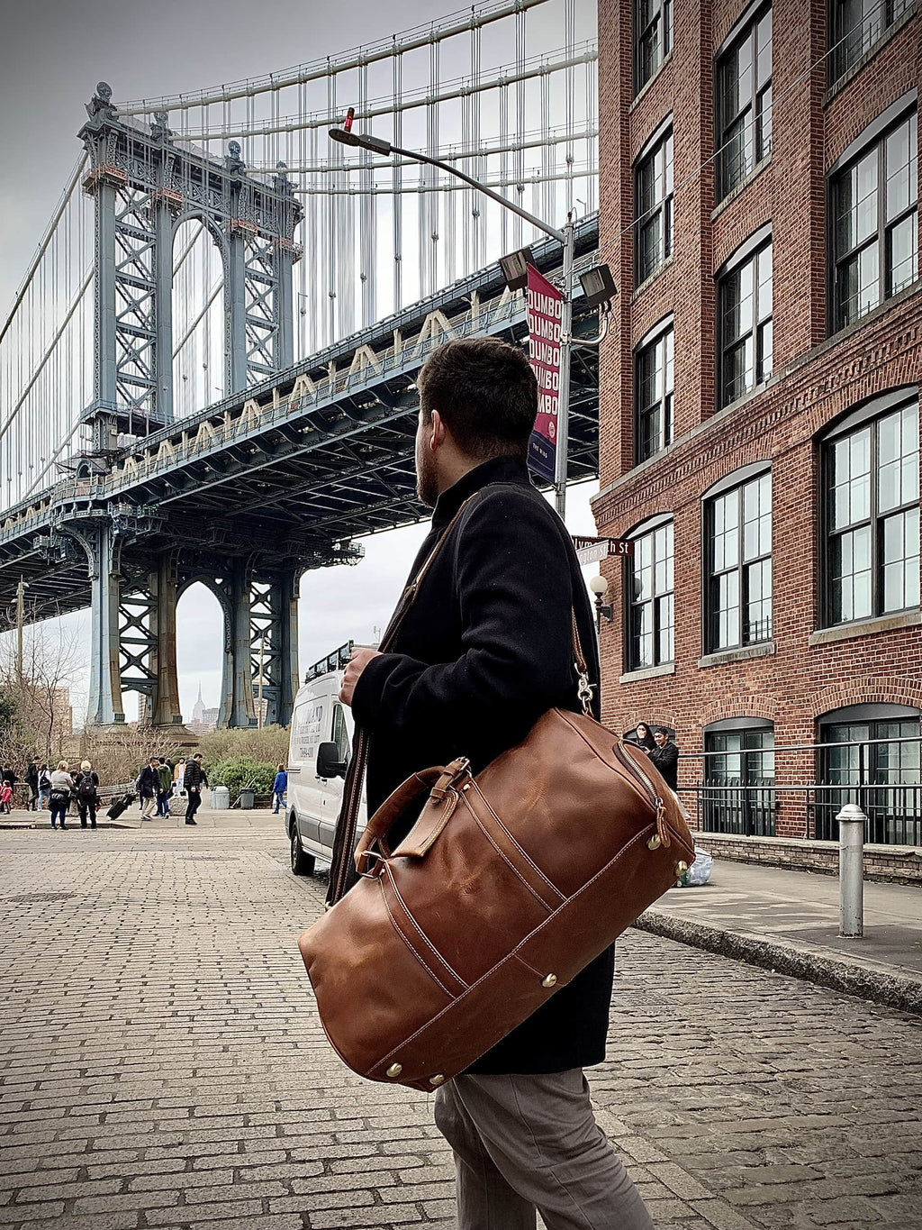 Dagny leather weekender duffle bag in vintage crazy horse leather with handles and shoulder strap for travel