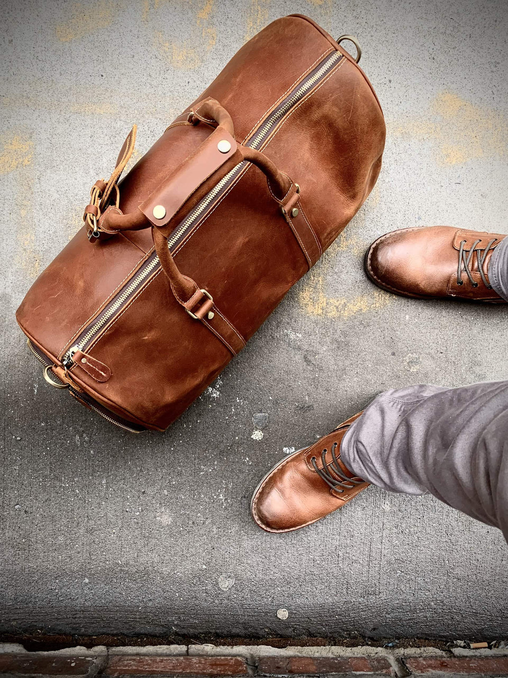 Dagny Leather Weekender Duffle Bag in premium crazy horse leather with spacious compartments and removable shoulder strap