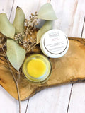 Organic scar healing serum bottle with natural ingredients like Manuka honey, Vitamin E, and tea tree oil