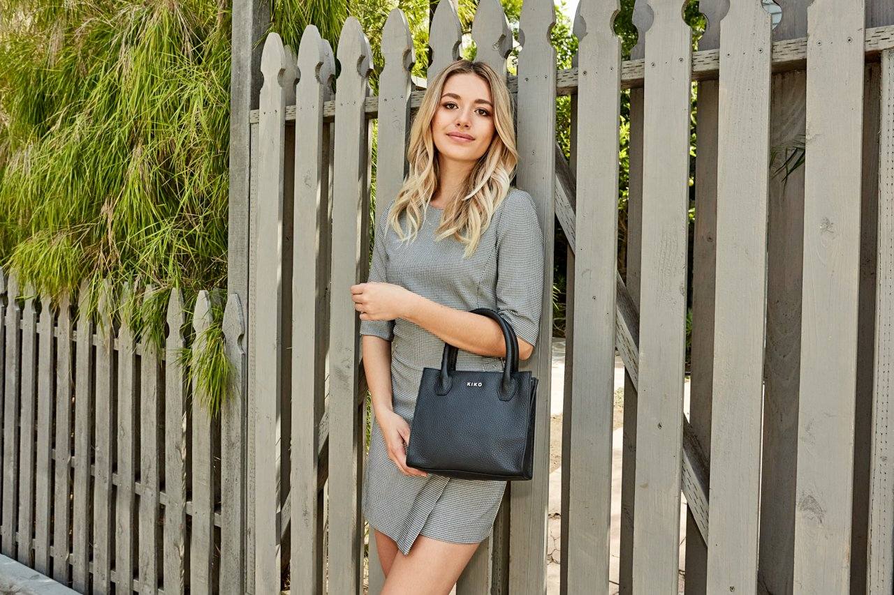 Kiko minimalist crossbody bag in genuine pebble leather with adjustable strap and secure zipper pocket