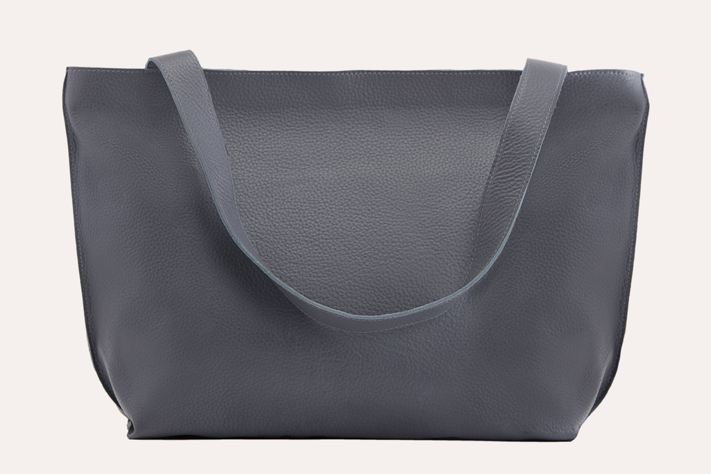Kiko On The Go Tote Bag genuine leather soft box design with top zip closure and internal pockets for organized storage