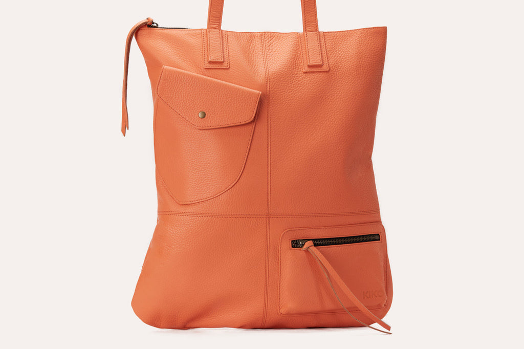 Kiko Fold n Hold Tote in cowhide leather with plaid lining and exterior pockets