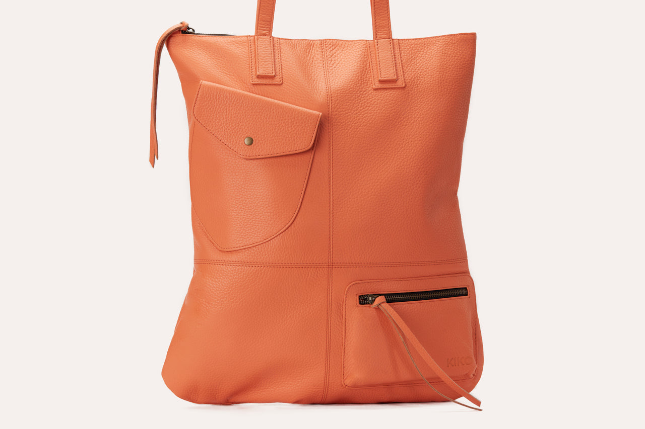Kiko Fold n Hold Tote in cowhide leather with plaid lining and exterior pockets