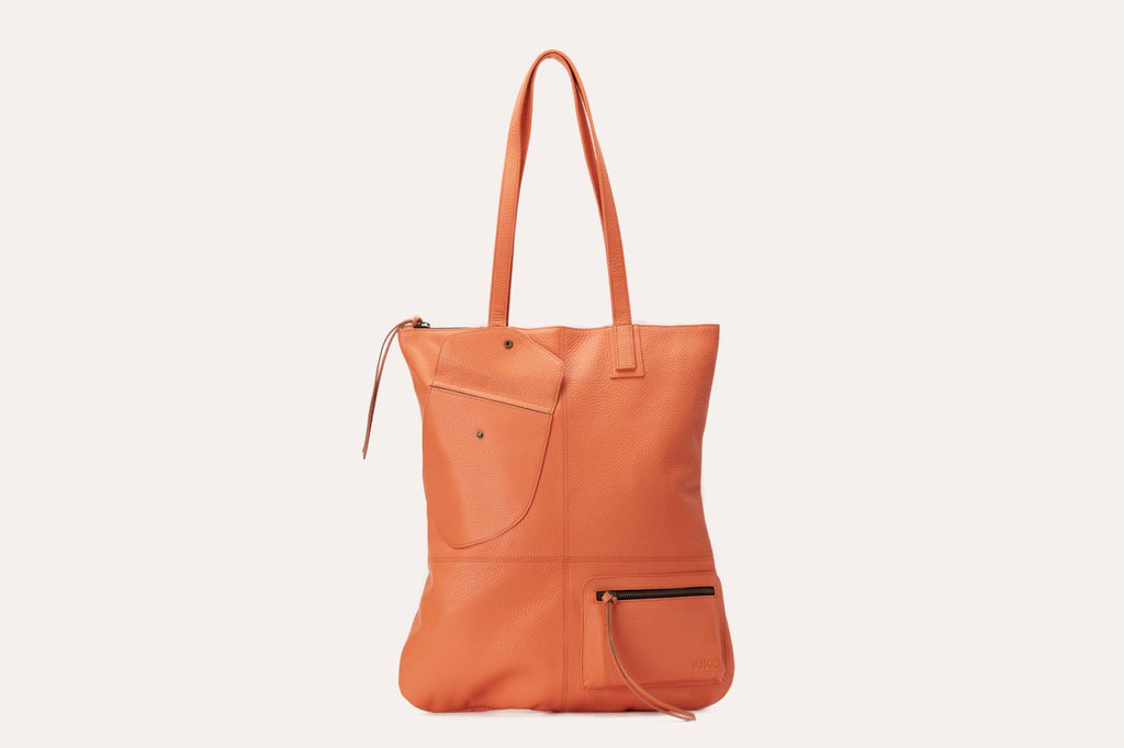 Fold n Hold Tote in cowhide leather with large interior pocket and two exterior pockets, 18.25" L x 14.5" W