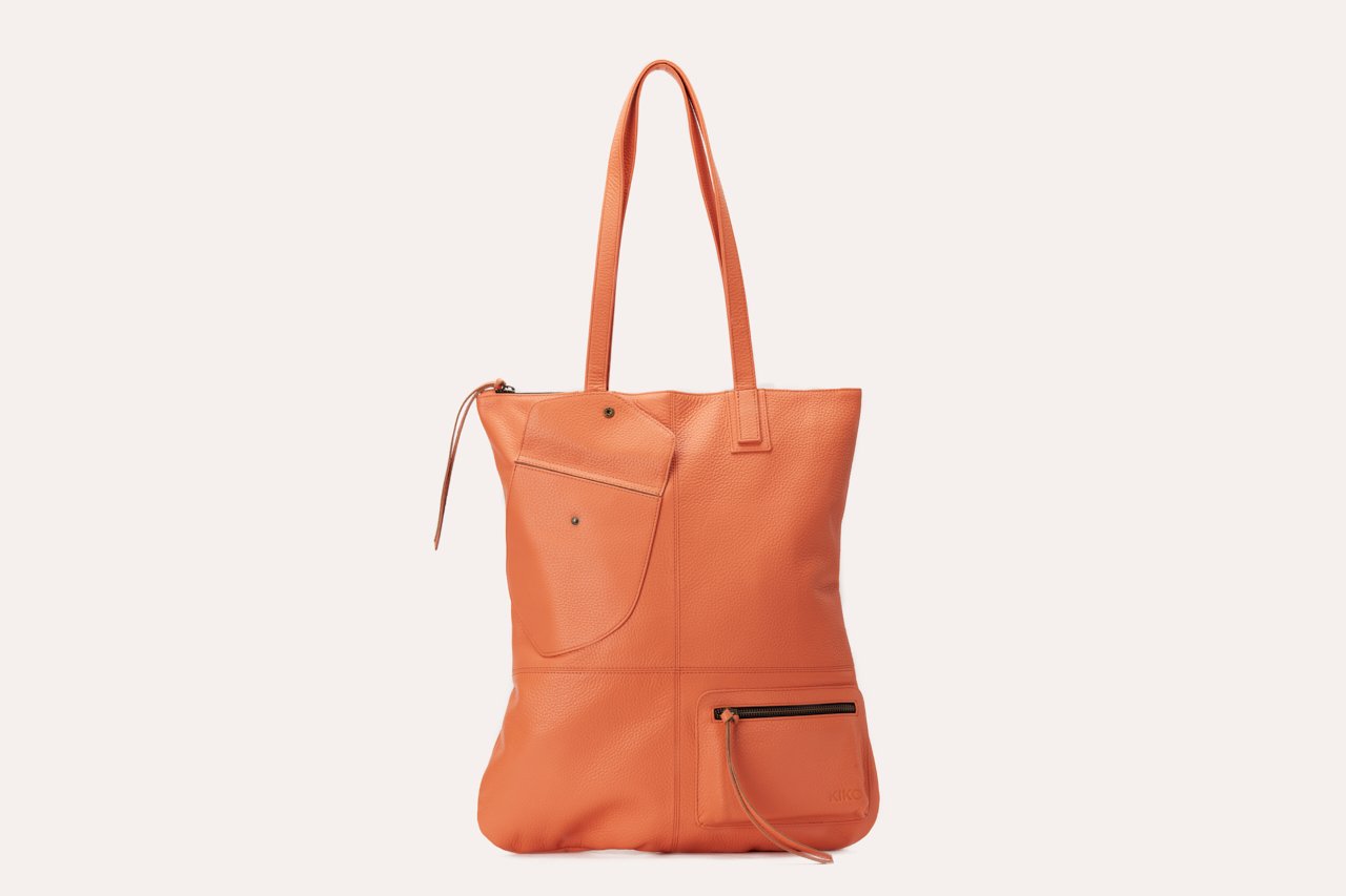Fold n Hold Tote in cowhide leather with large interior pocket and two exterior pockets, 18.25" L x 14.5" W